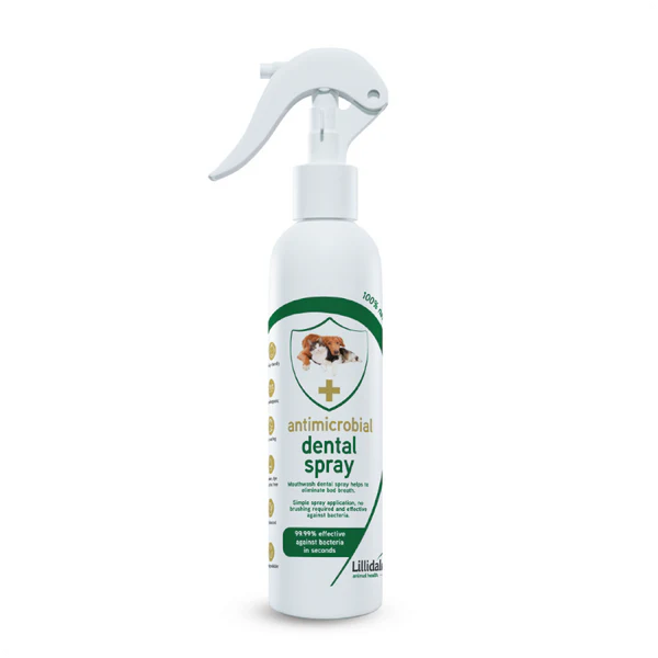 White dental spray for dogs and cats bottle with green label on a white background